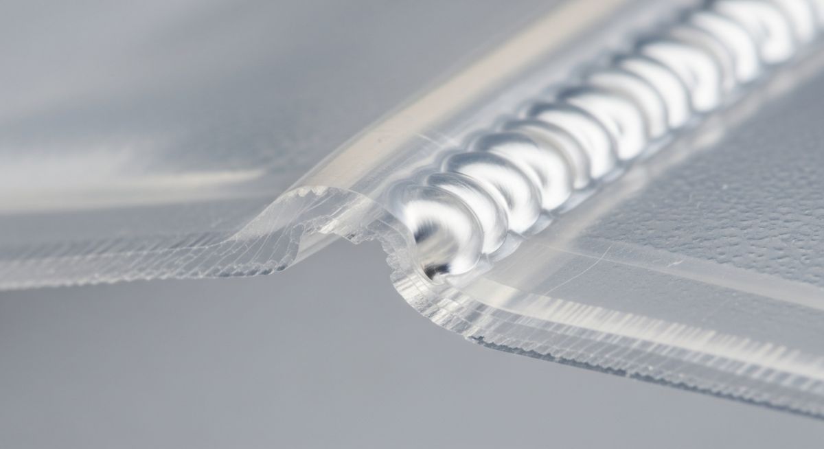 Detailed cross-section of a hermetic seal produced by High-Frequency Welding on medical grade PVC