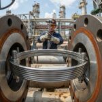 Industrial Spiral Wound Gasket installation on high-pressure piping flanges.