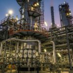 Industrial hydrotreating reactor vessel under processing conditions in a petroleum refinery