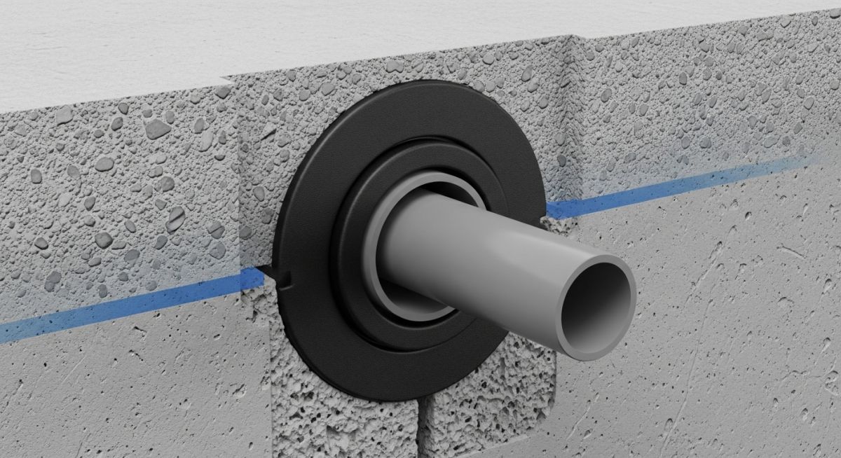 A puddle flange installed on a PVC pipe embedded in a concrete wall cross-section