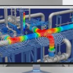 3D CAD model of piping system showing dynamic stress analysis heat map on a monitor