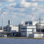 Industrial green ammonia production facility integrated with renewable energy sources.