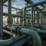 Industrial installation of GRP piping systems complying with ISO 14692-2017 standards.
